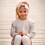 Bluzka dziewczęca longsleeve  z falbankami beżowa