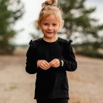 Black cotton blouse with ruffles on shoulders