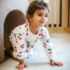 Pajac dziewczęcy bez stópek ecru w wisienki
