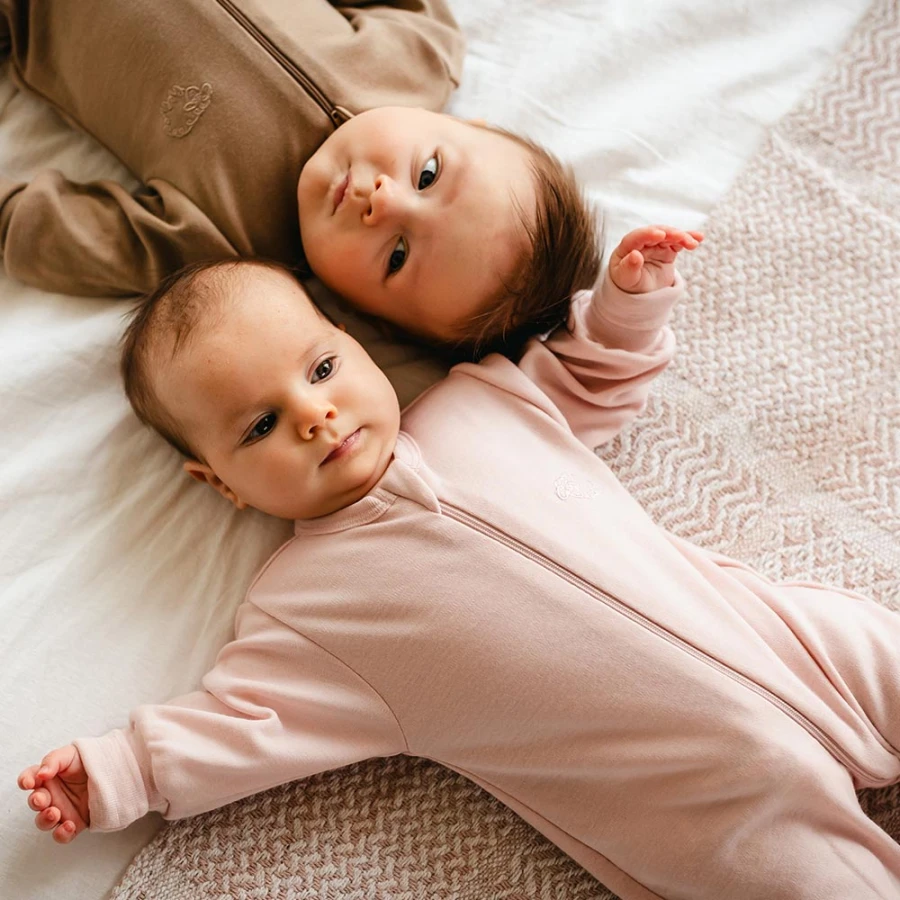 Pink merino kids romper growing with your child