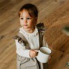 Elegant baby bodysuit with frill ecru
